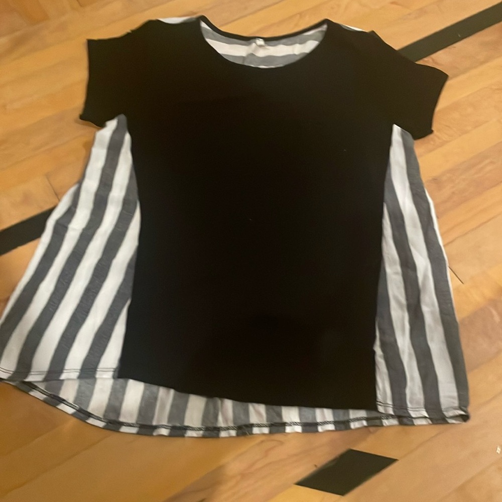 Women’s shirt. striped and plain black. pocket on right front.